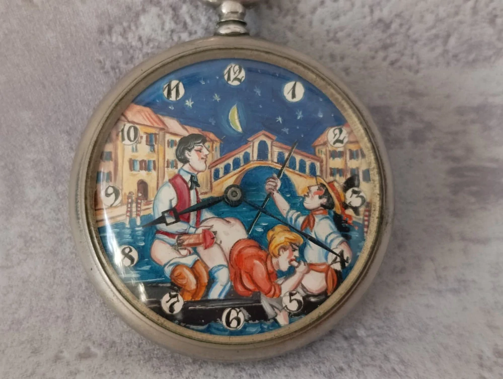 Historické kapesni hodniky DOXA s erotickým motivem