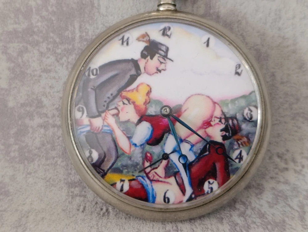 Historické kapesni hodinky DOXA s erotickým motivem
