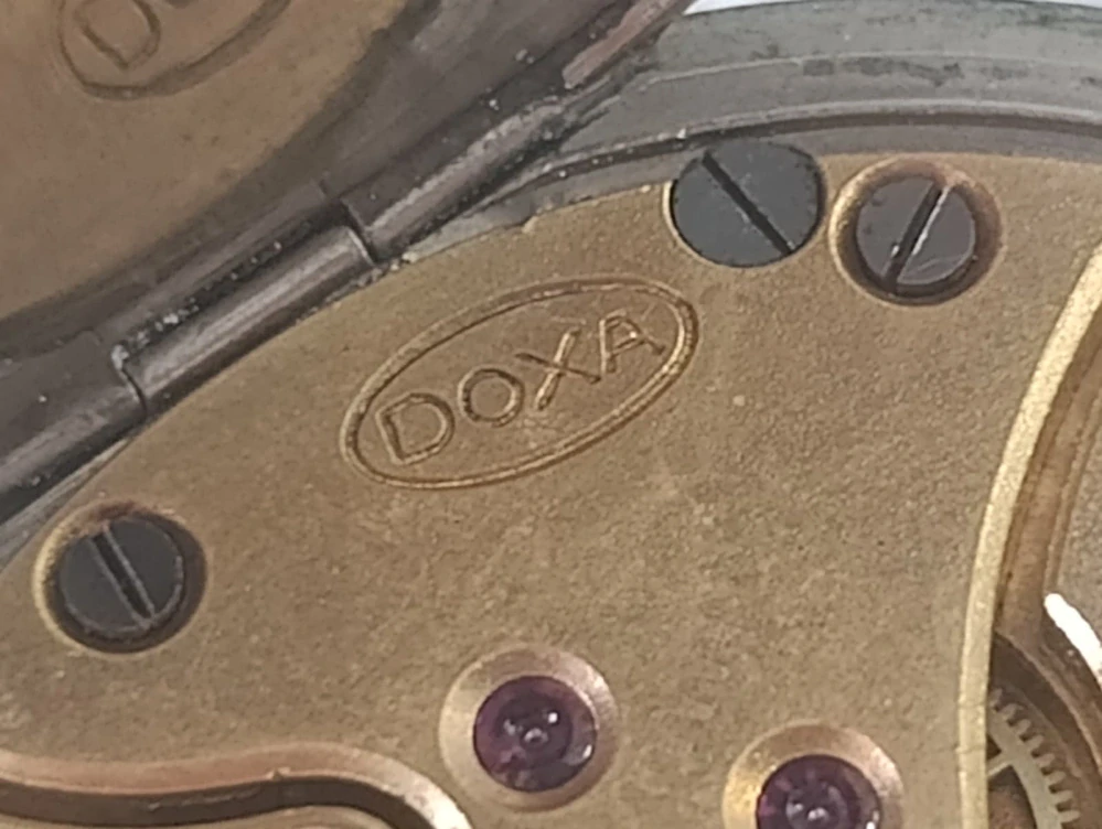 Starožitné kapesní hodinky DOXA erotický motiv